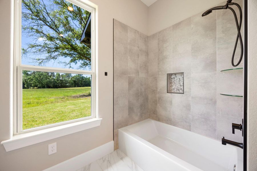 Furnished interior view inside a new home in , New Waverly (Image 39).