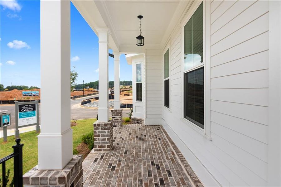 Exterior details and patio area of a home in Promenade at Sawnee Village, Cumming (Image 3). Exterior details and patio area of a home in Promenade at Sawnee Village, Cumming (Image 3).