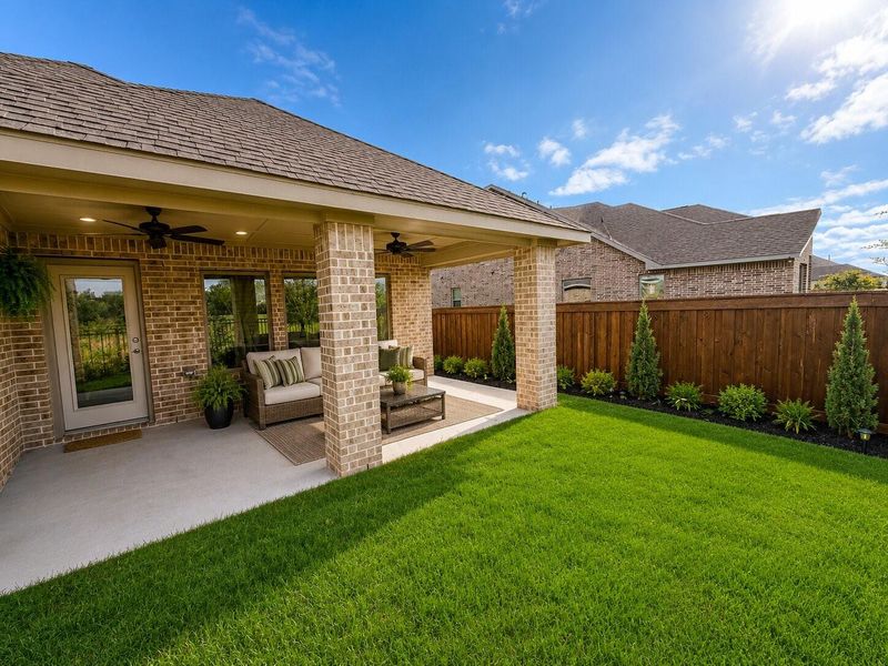 Exterior details and patio area of a home in Dunham Pointe, Cypress (Image 3). Exterior details and patio area of a home in Dunham Pointe, Cypress (Image 3).