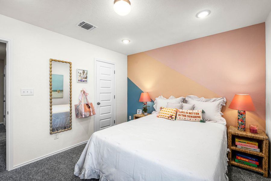 These are the secondary bedrooms of the Hawkins plan and is the model home in Carillon at 13305 Eppright Trace Blvd., Manor, TX. These are the secondary bedrooms of the Hawkins plan and is the model home in Carillon at 13305 Eppright Trace Blvd., Manor, TX.