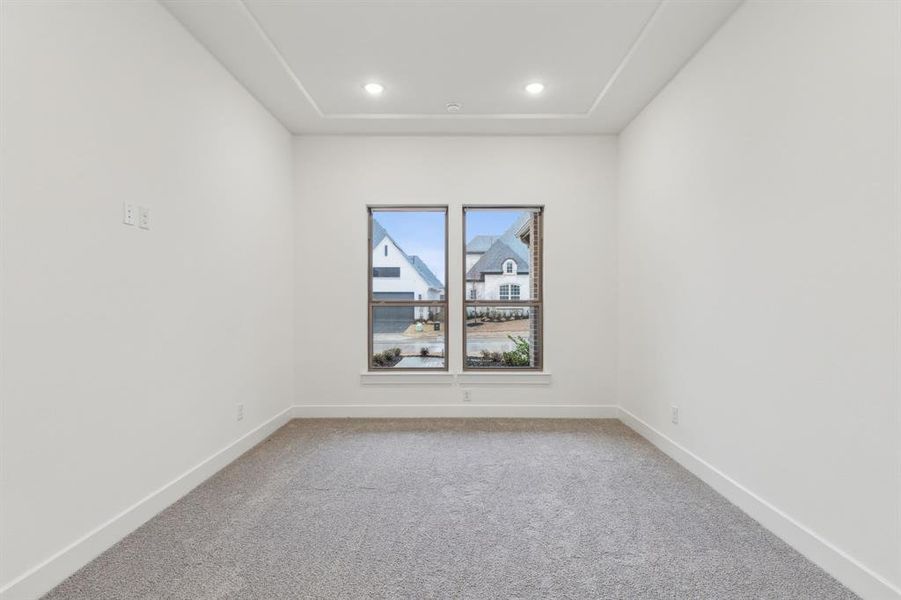 Empty room featuring carpet floors