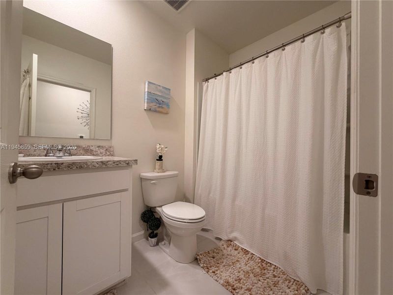 Furnished interior view inside a new home in , Port St. Lucie (Image 5).