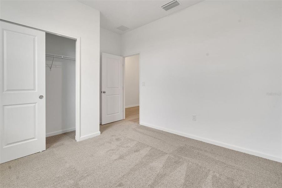 Spacious, unfurnished interior of a new home in Annabelle Estates, Winter Haven (Image 12). Spacious, unfurnished interior of a new home in Annabelle Estates, Winter Haven (Image 12).
