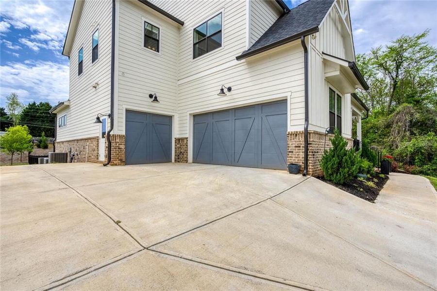 Front exterior of a new home in , Marietta, GA, highlighting curb appeal (Image 18). Front exterior of a new home in , Marietta, GA, highlighting curb appeal (Image 18).