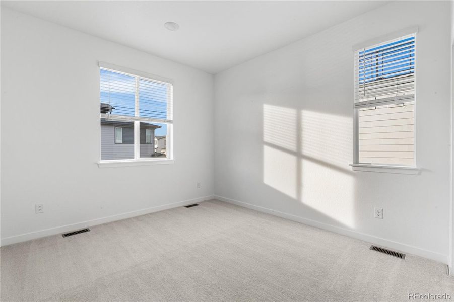 Spacious, unfurnished interior of a new home in Sterling Ranch Apex Collection, Littleton (Image 14).