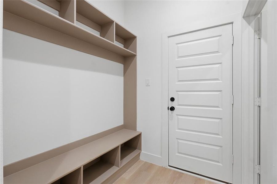 Mudroom featuring light wood-style floors Mudroom featuring light wood-style floors