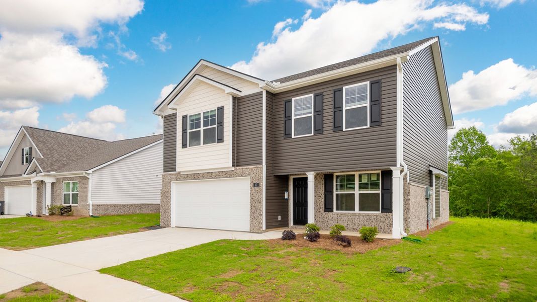 Front exterior of a new home in Price's Crossing, LaFayette, GA, highlighting curb appeal (Image 2).