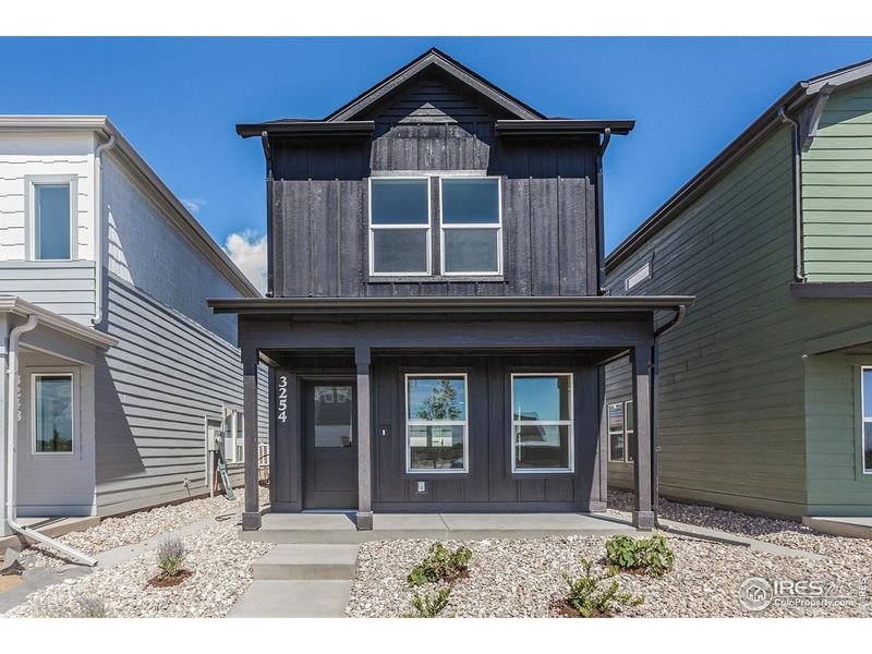 Front exterior of a new home in Bloom Trailblazer Collection - Single Family Homes, Fort Collins, CO, highlighting curb appeal (Image 23).