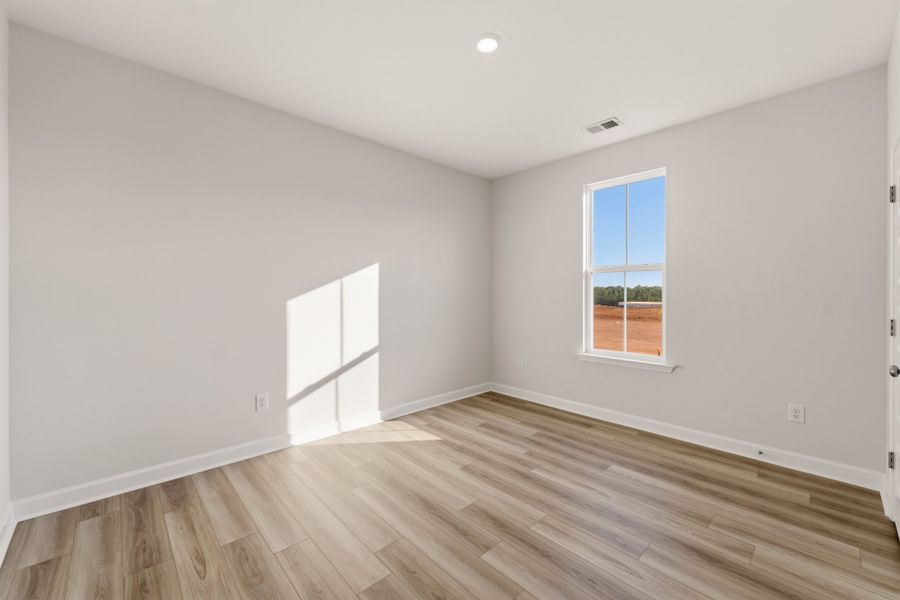 Spacious, unfurnished interior of a new home in Cottages at Lake Emory, Inman (Image 24). Spacious, unfurnished interior of a new home in Cottages at Lake Emory, Inman (Image 24).