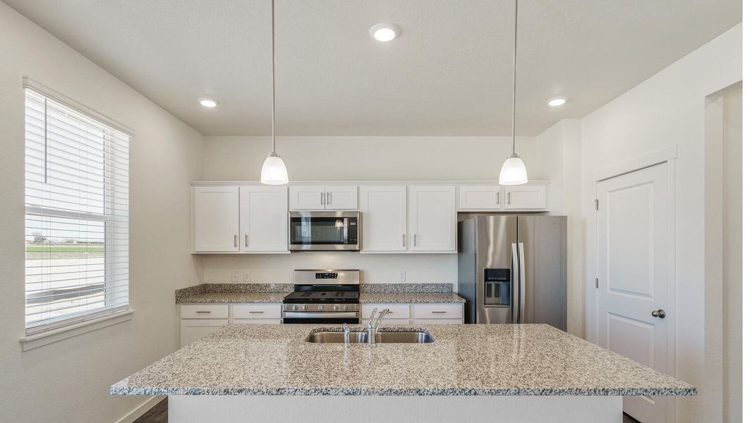 Furnished interior view inside a new home in Silver Peaks, Lochbuie (Image 6).