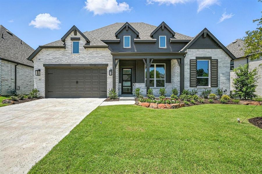 Front exterior of a new home in Thompson Farms: 60ft. lots, Van Alstyne, TX, highlighting curb appeal (Image 21). Front exterior of a new home in Thompson Farms: 60ft. lots, Van Alstyne, TX, highlighting curb appeal (Image 21).