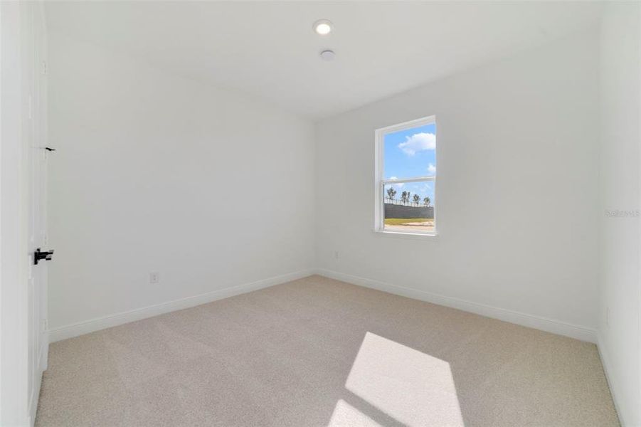 Spacious, unfurnished interior of a new home in Vintner Reserve, Clermont (Image 13).