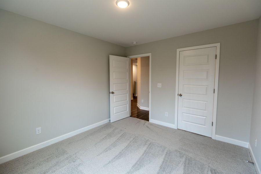 Representative unfurnished interior of a home built from the Dalton by Parkside Builders in The Woods, Gallatin (Image 22).