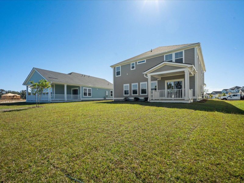 Exterior details and patio area of a home in The Coves at Lakes of Cane Bay, Summerville (Image 27).