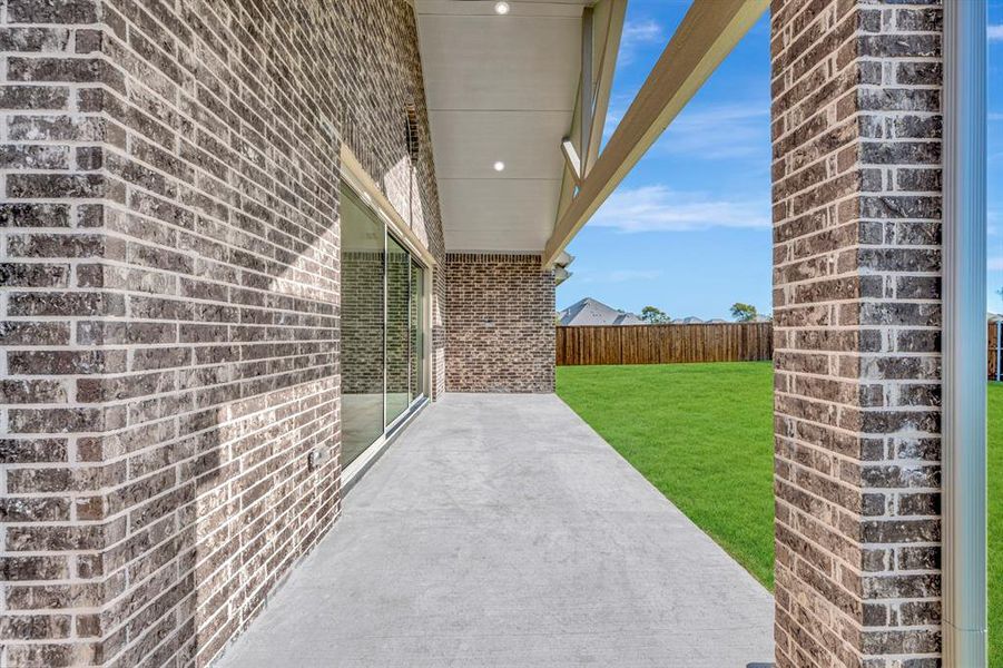Exterior details and patio area of a home in Kreymer at the Park, Wylie (Image 2). Exterior details and patio area of a home in Kreymer at the Park, Wylie (Image 2).