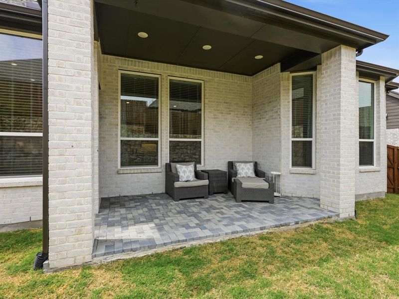 Exterior details and patio area of a home in Thompson Farms, Van Alstyne (Image 3).