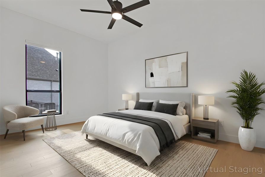Virtually-Staged Bedroom #4 with light hardwood flooring, ceiling fan, and vaulted ceiling