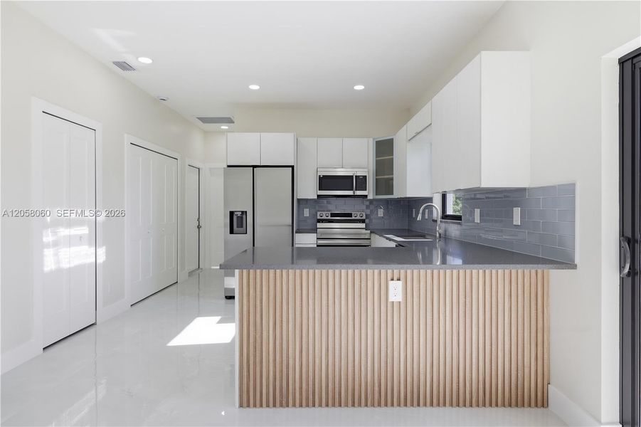 Furnished interior view inside a new home in , Lehigh Acres (Image 9).