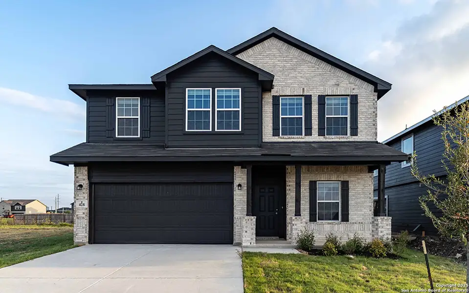 Front exterior of a new home in Hannah Heights, Seguin, TX, highlighting curb appeal (Image 2). Front exterior of a new home in Hannah Heights, Seguin, TX, highlighting curb appeal (Image 2).