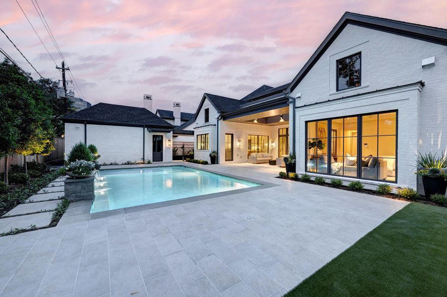 Expansive pool deck has room for loungers or additional open air dining.  Oversized 2 car garage has epoxy flooring.