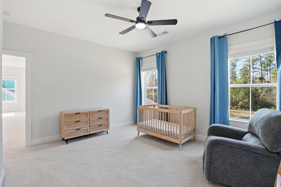 Furnished interior view inside a new home in Tidewater at Lakes of Cane Bay, Summerville (Image 39).