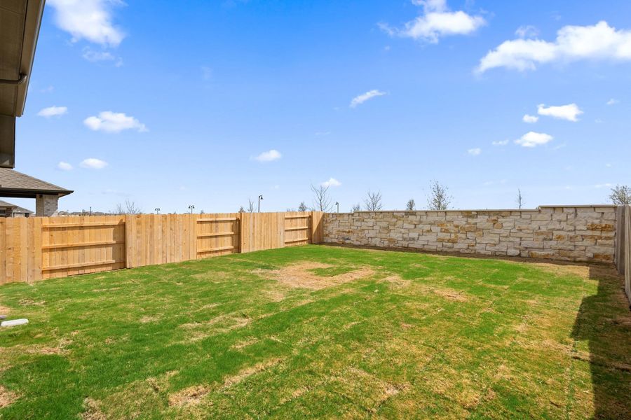 Exterior details and patio area of a home in Flora, Hutto (Image 25).