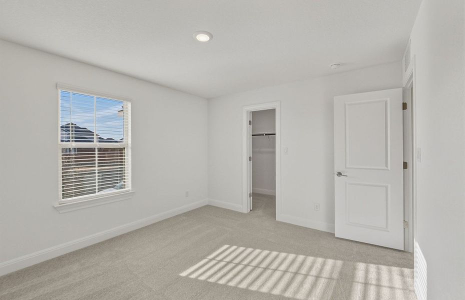 Spacious, unfurnished interior of a new home in Saddleback at Santa Rita Ranch, Liberty Hill (Image 39).