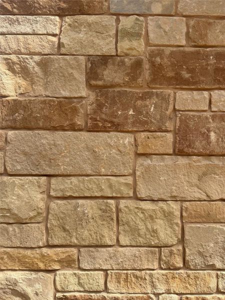 Tired of white limestone?  Block sandstone gives the home a unique look.