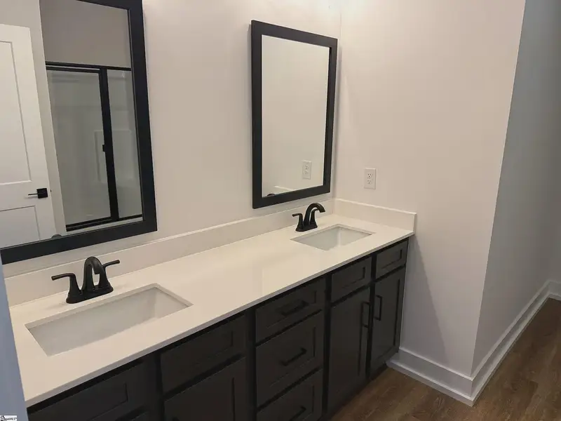 Furnished interior view inside a new home in Hidden Lake Estates, Greenville (Image 6).