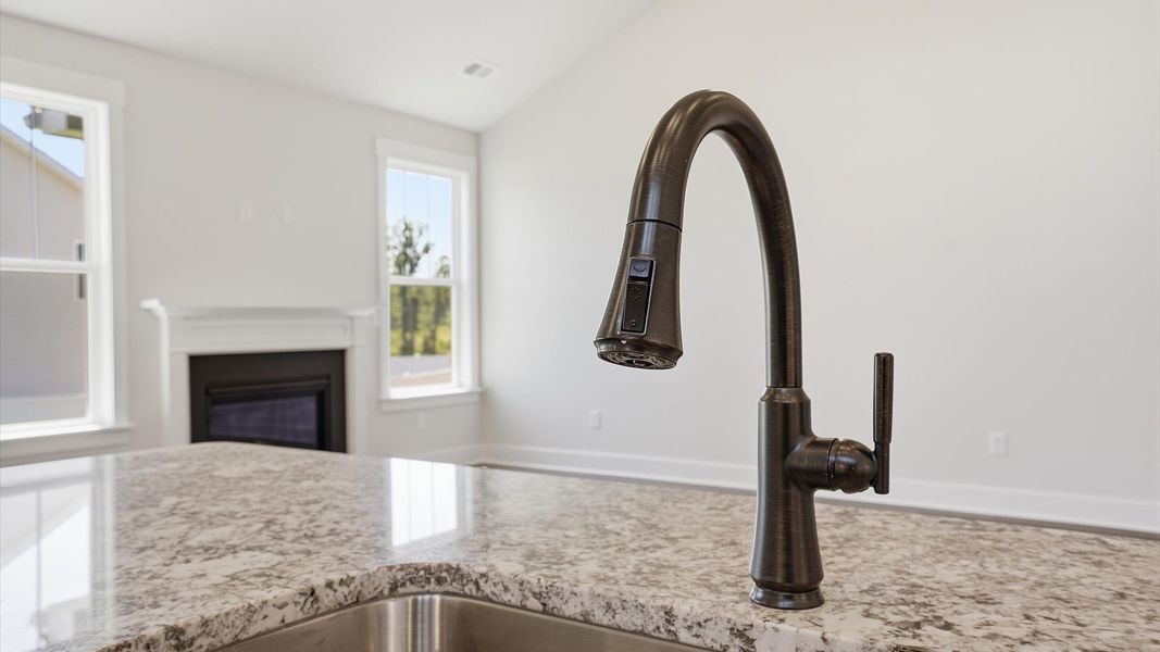 Accomplished design in a kitchen that blends function and form with a right-sized island Accomplished design in a kitchen that blends function and form with a right-sized island