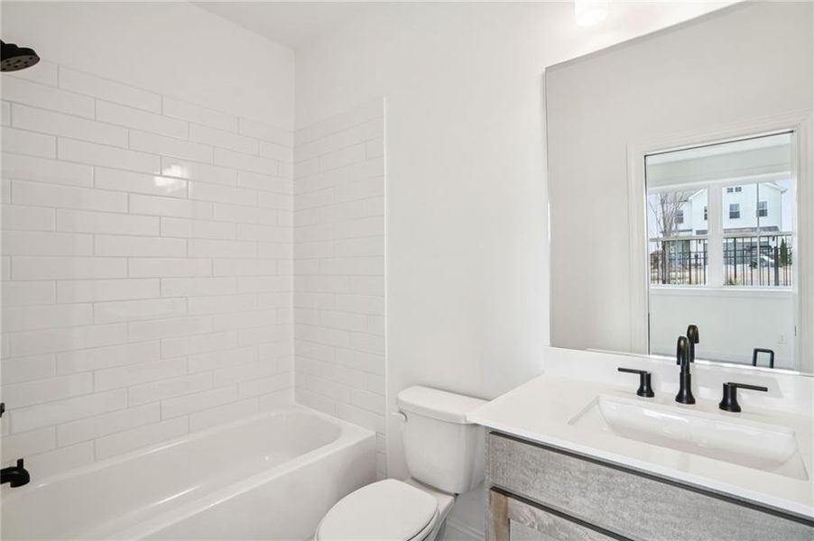 Furnished interior view inside a new home in Palisades Townhomes, Cumming (Image 6).