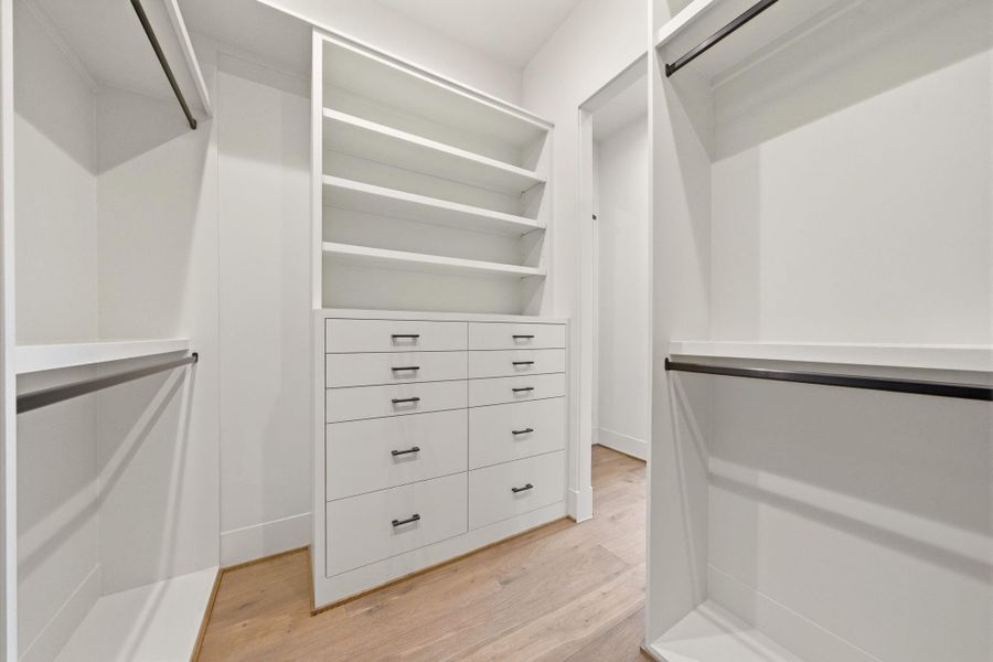 Two walk-in primary closets!