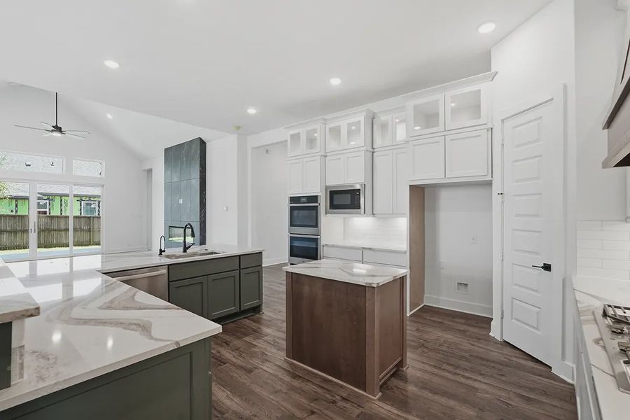 Representative furnished interior of a home built from the Kingston by Chesmar Homes in Prominence 60's, San Antonio (Image 10).