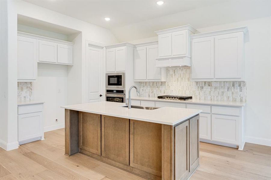 Furnished interior view inside a new home in Windsong Ranch Classic 61, Prosper (Image 8). Furnished interior view inside a new home in Windsong Ranch Classic 61, Prosper (Image 8).