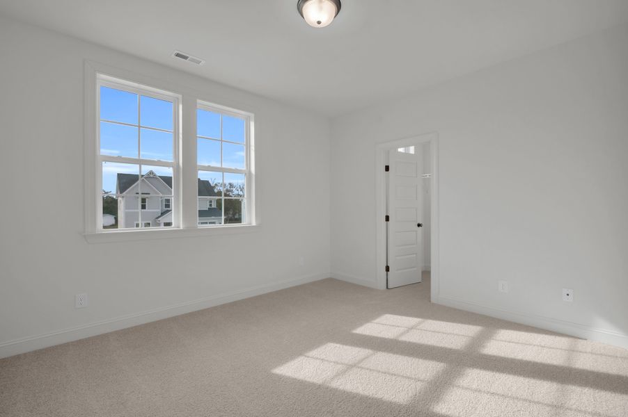 Representative unfurnished interior of a home built from the The Hampton by RobuckHomes in Windwater, Hampstead (Image 23).