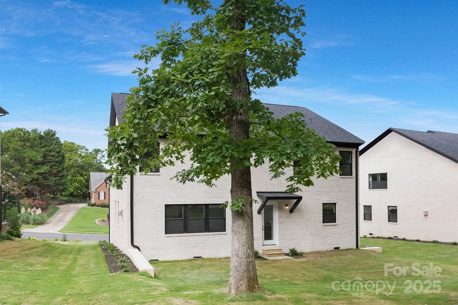Front exterior of a new home in , Charlotte, NC, highlighting curb appeal (Image 18).