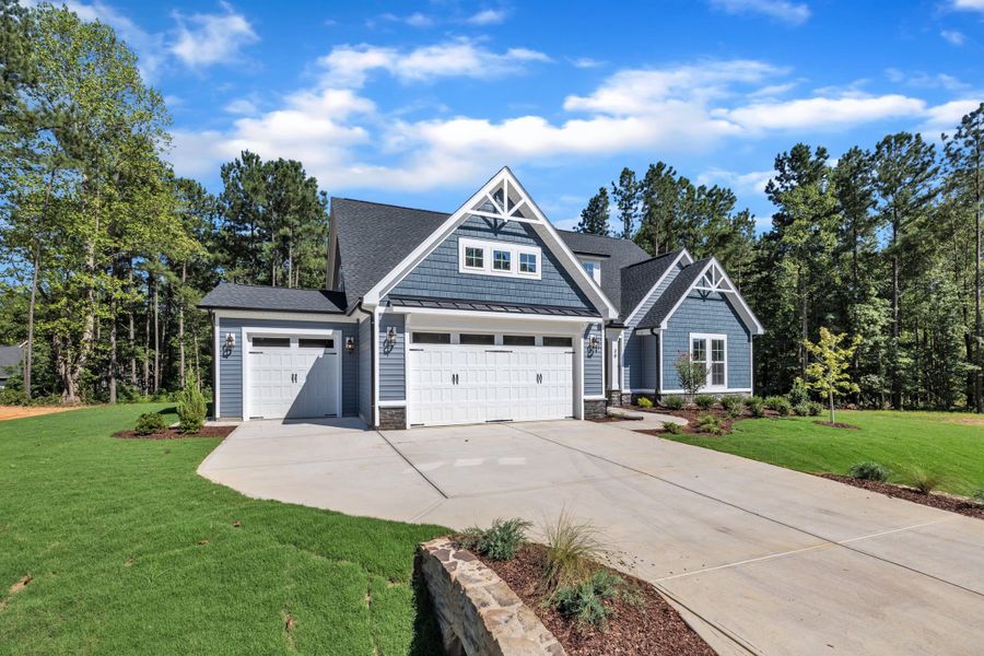 Representative exterior photo of a completed home built from the The Bradley by RobuckHomes in Baylee Ridge, Selma, NC (Image 42). Representative exterior photo of a completed home built from the The Bradley by RobuckHomes in Baylee Ridge, Selma, NC (Image 42).