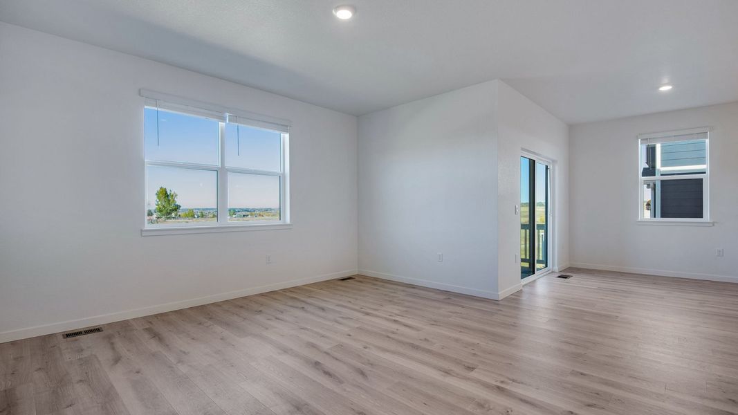 Spacious, unfurnished interior of a new home in Trails at Crowfoot, Parker (Image 17).
