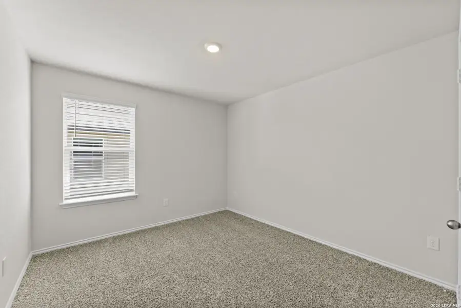 Spacious, unfurnished interior of a new home in Laurel Vistas, San Antonio (Image 26).