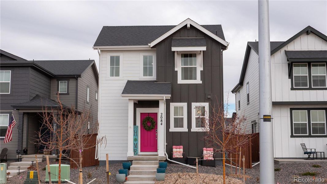 Front exterior of a new home in , Aurora, CO, highlighting curb appeal (Image 24).