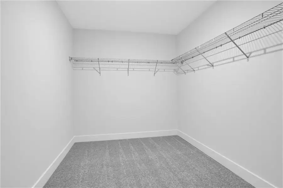 Spacious, unfurnished interior of a new home in Towns at Holly Springs, Holly Springs (Image 17).