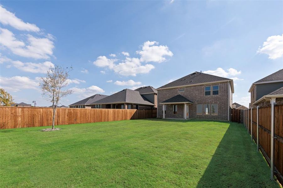 Exterior details and patio area of a home in Arbors at Legacy Hills, Celina (Image 4).