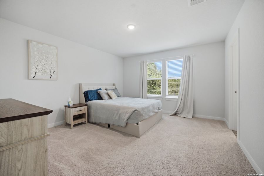 Furnished interior view inside a new home in Senna, San Antonio (Image 12).