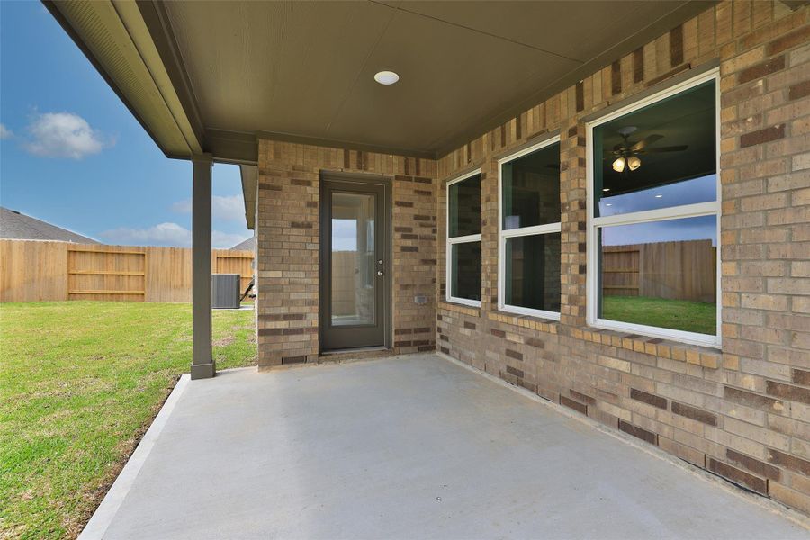 Exterior details and patio area of a home in River Ranch, Dayton (Image 3).