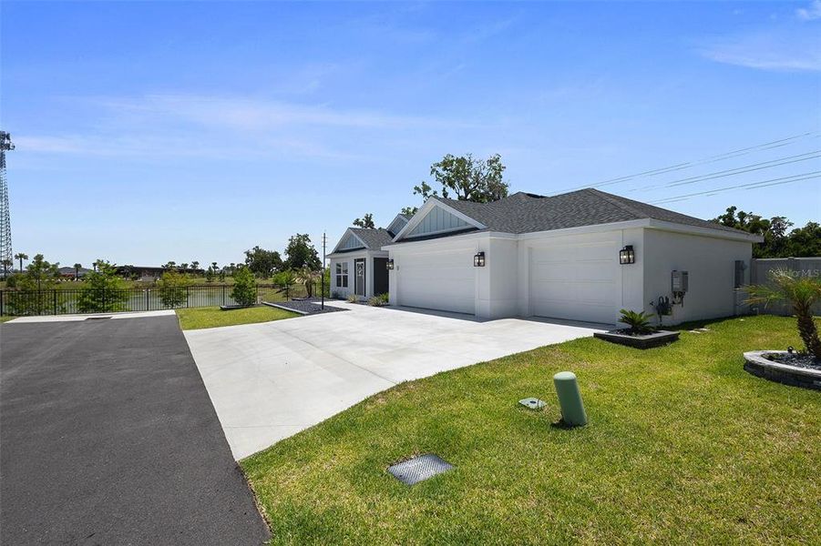 Front exterior of a new home in , The Villages, FL, highlighting curb appeal (Image 26).