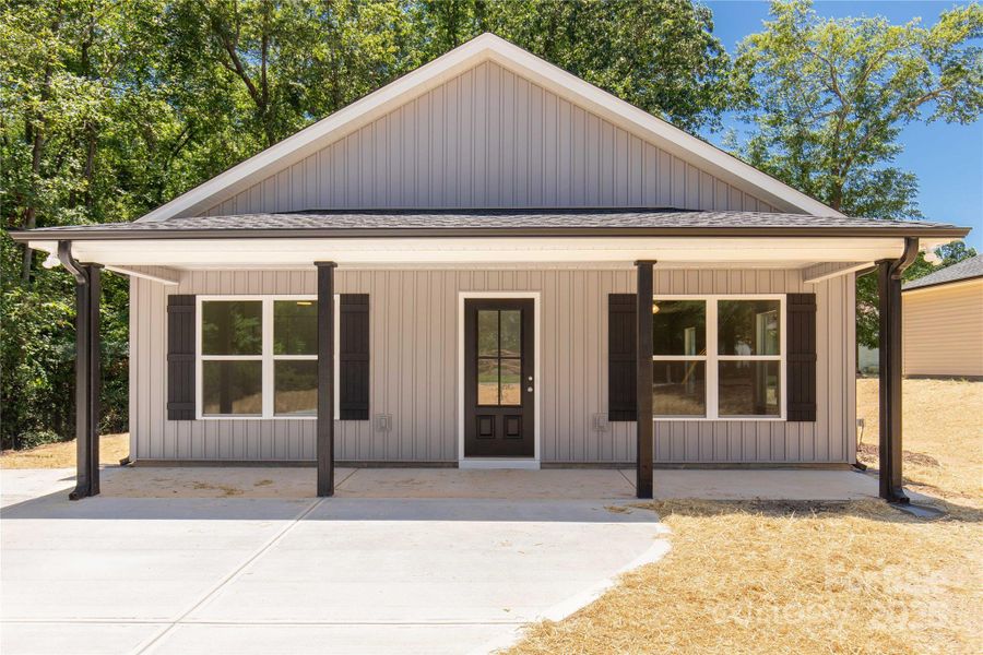 Front exterior of a new home in , Clover, SC, highlighting curb appeal (Image 13).