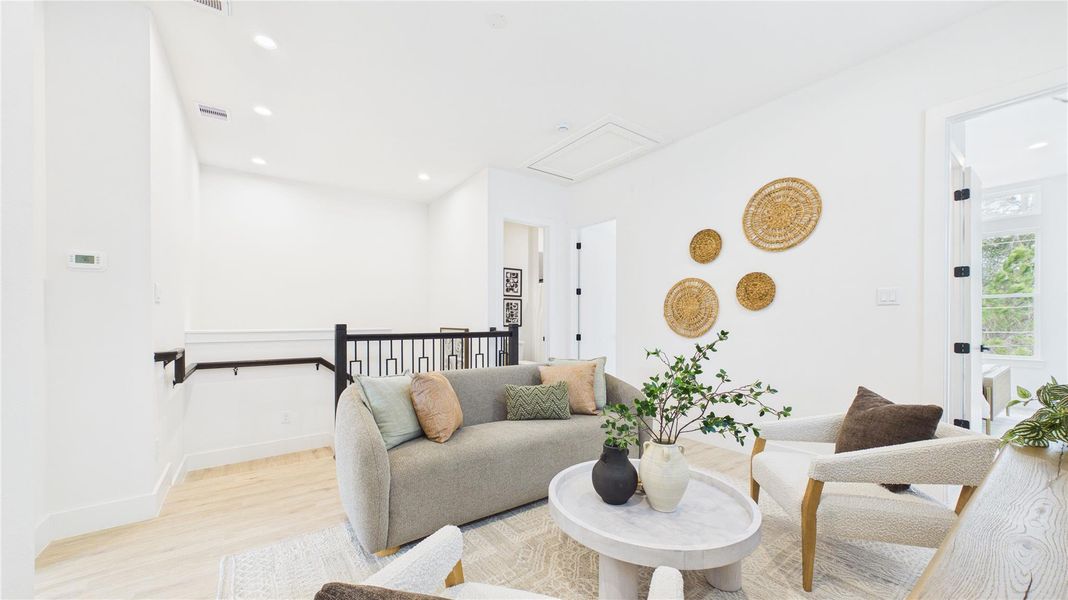 This additional living area upstairs provides you with the flexibility of offering another area to relax, work, or convert into a hobby/play room!