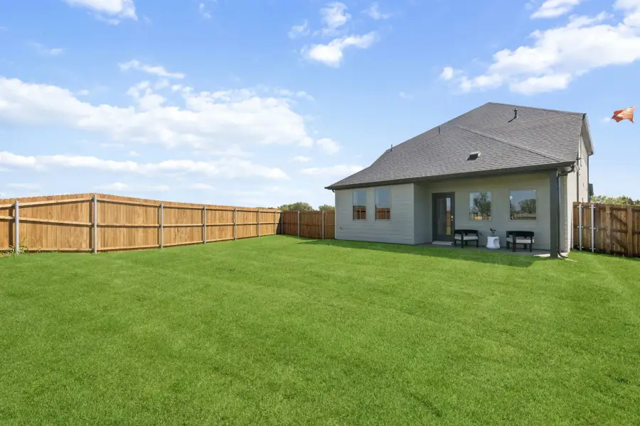Backyard in the Magnolia home plan by Trophy Signature Homes – REPRESENTATIVE PHOTO Backyard in the Magnolia home plan by Trophy Signature Homes – REPRESENTATIVE PHOTO