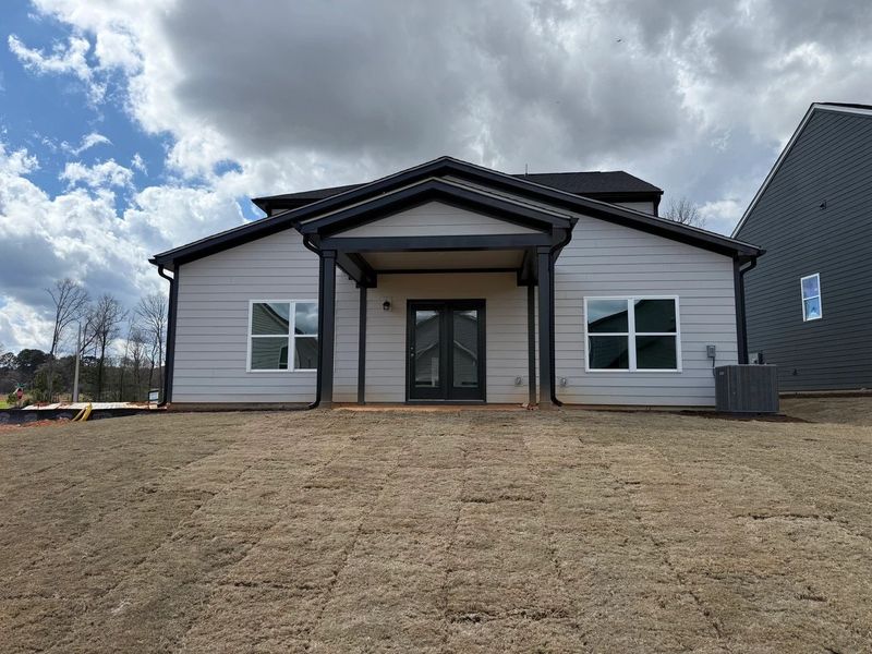 Exterior details and patio area of a home in Rowland's Grant, Fuquay Varina (Image 4). Exterior details and patio area of a home in Rowland's Grant, Fuquay Varina (Image 4).