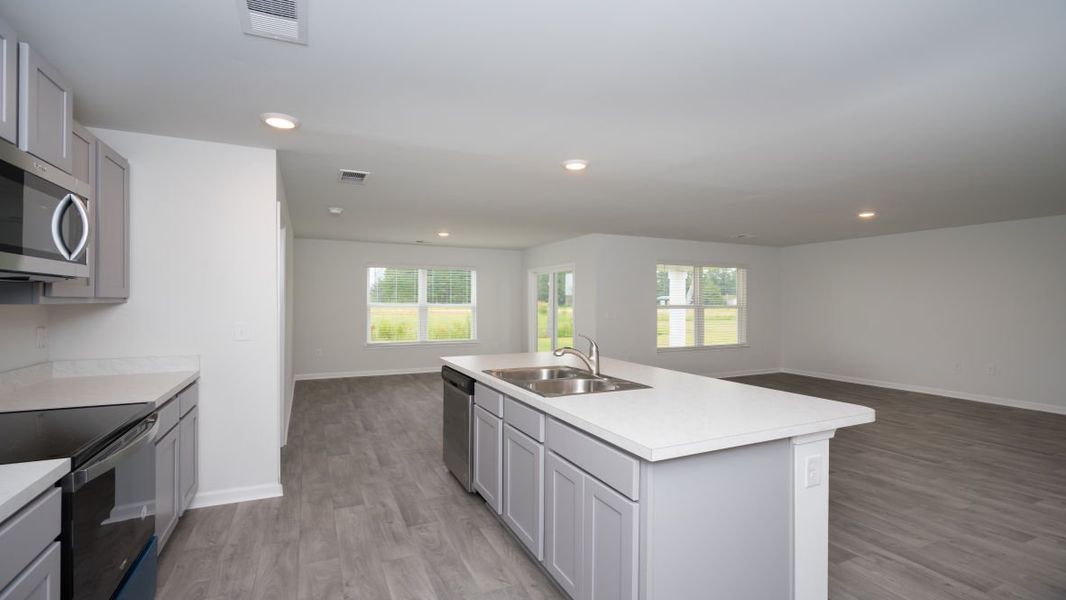 Representative furnished interior of a home built from the ARIA by D.R. Horton in The Meadows at Wildwood Village, Shallotte (Image 10). Representative furnished interior of a home built from the ARIA by D.R. Horton in The Meadows at Wildwood Village, Shallotte (Image 10).